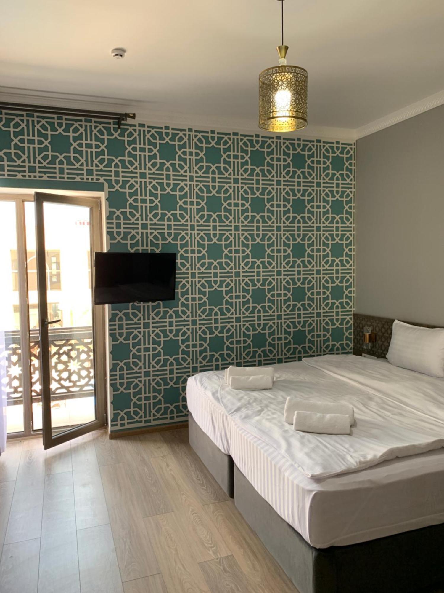 Khan Hotel Samarkand Værelse billede