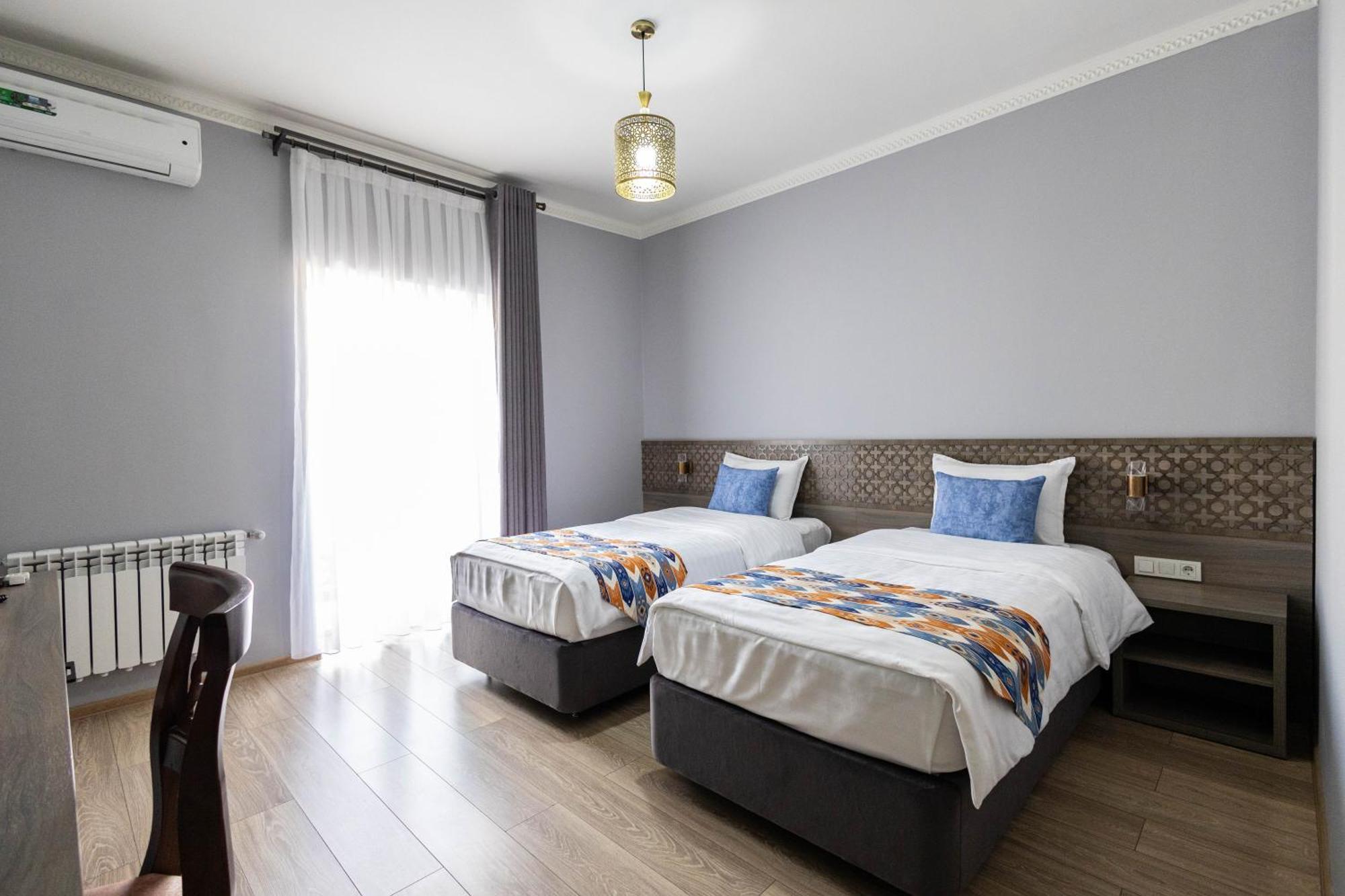 Khan Hotel Samarkand Værelse billede